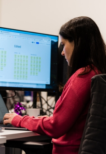 A woman working at a computer